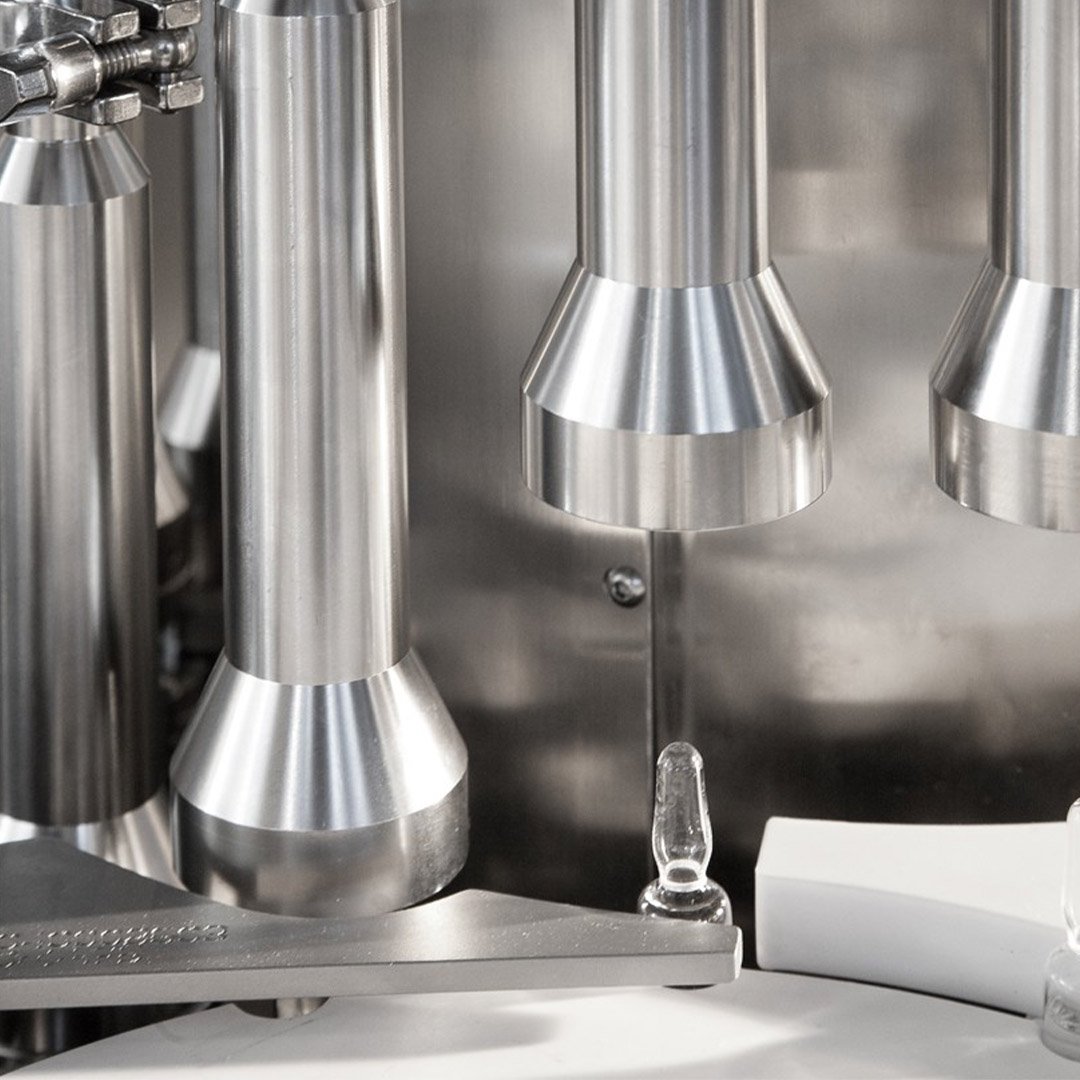 close up of pressure decay leak testers and ampoule